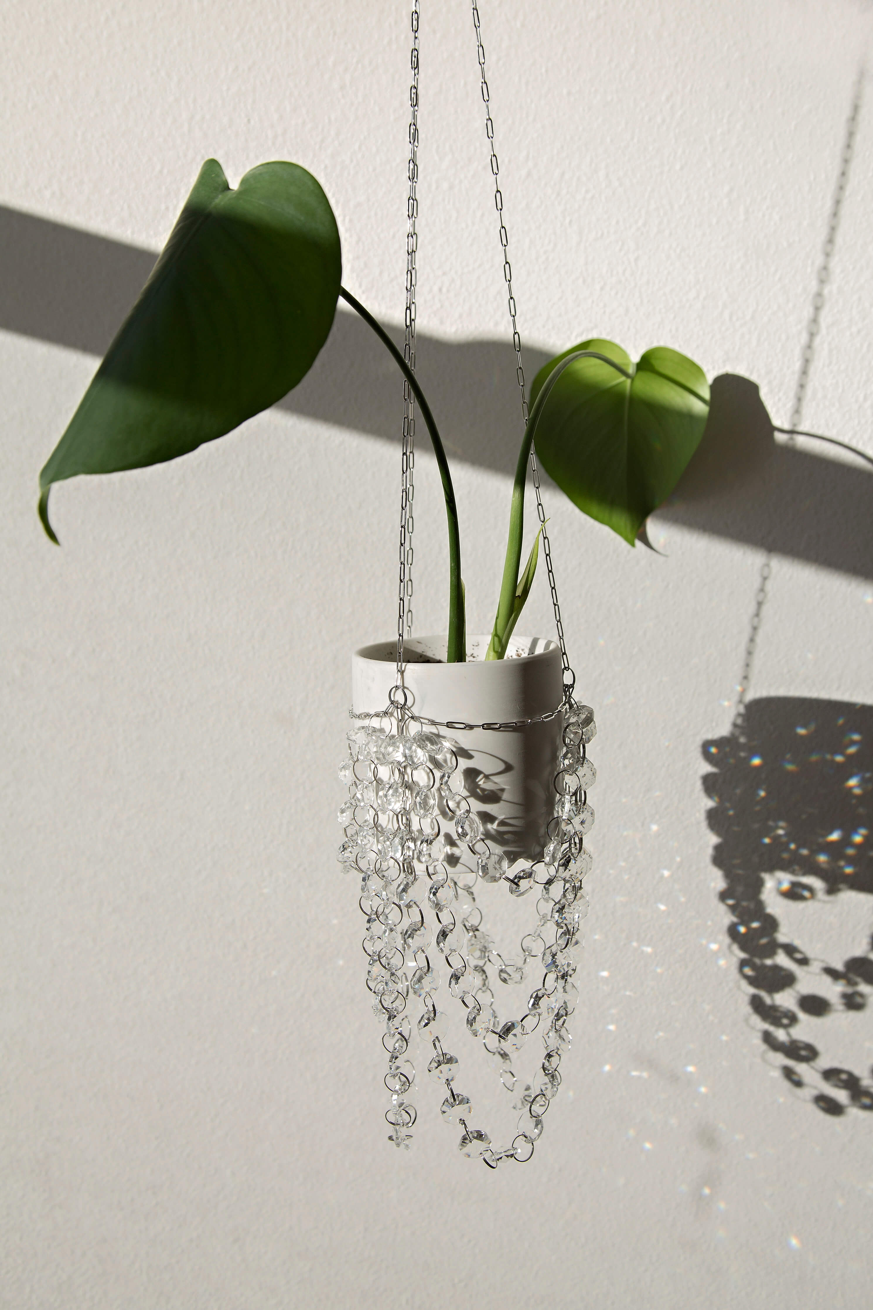 hanging planter chandelier Floating Chandelier Suncatcher Plant Hanger in Silver – Air Blush
